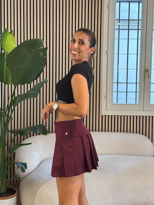 Gonna mini pantaloncino a pieghe