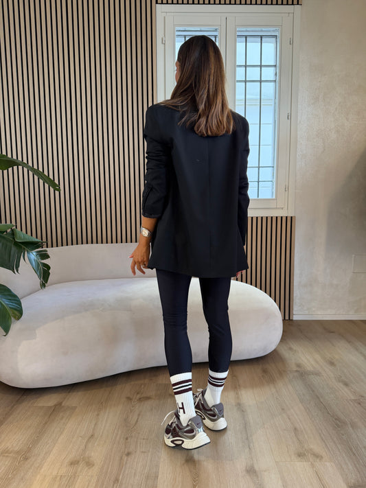 Leggins in lycra lucida con elastico nero