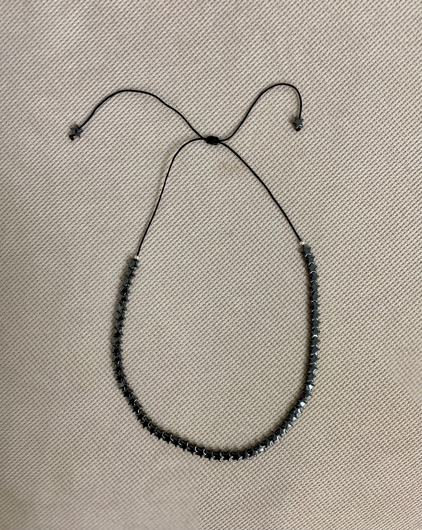 Collana regolabile stella medie bombate