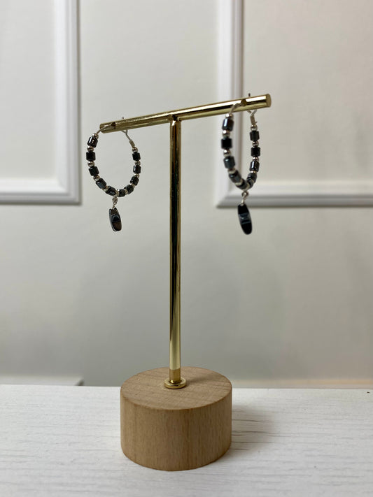 Orecchini cerchi medi stella pendente