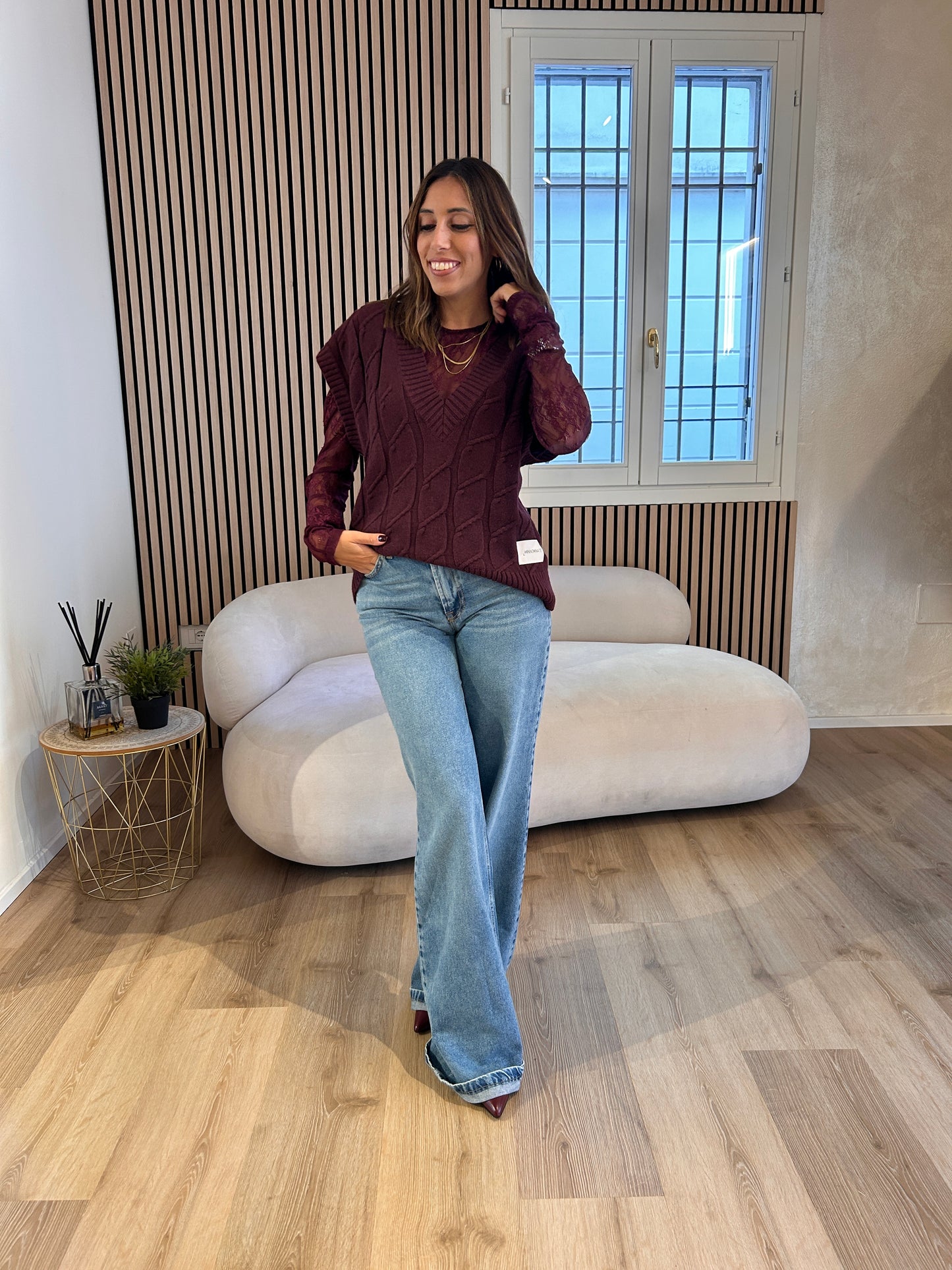 Gilet in maglia con trecce